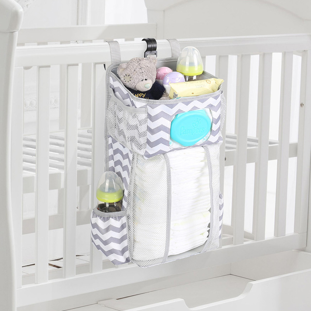 Attachable baby bed storage bags