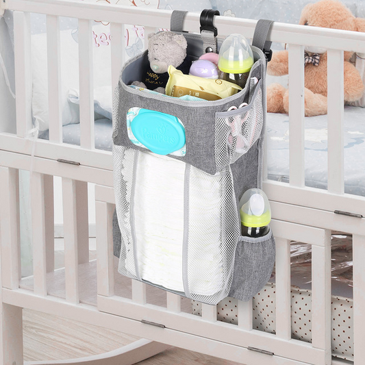 Attachable baby bed storage bags